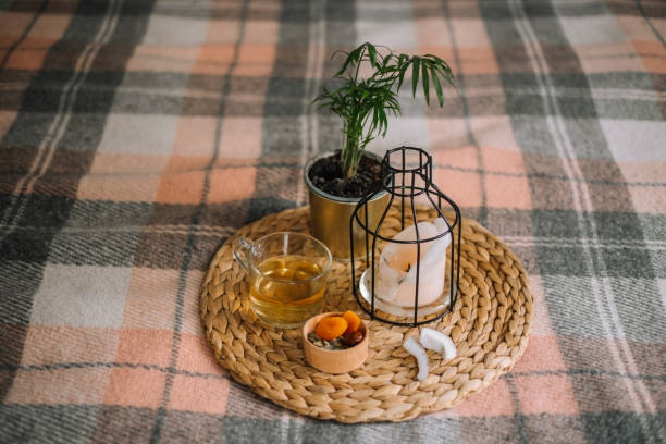 Warm herbal tea and stretching mat for evening relaxation